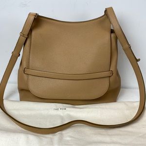 The Row pebbled sand color sideby bag